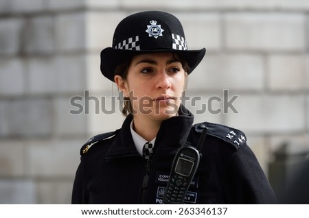 CITY OF LONDON ENGLAND 13 March 2015:  Metropolitan Policewoman on duty