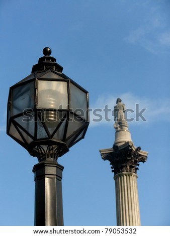 nelson column with streetlight in foreground