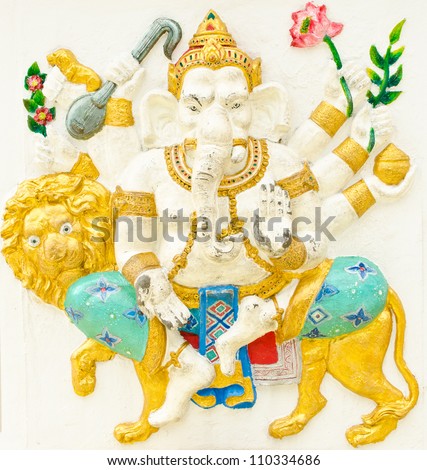 God of success 14 of 32 posture. Indian style or Hindu God Ganesha avatar image in stucco low relief technique with vivid color,Wat Samarn, Chachoengsao,Thailand.