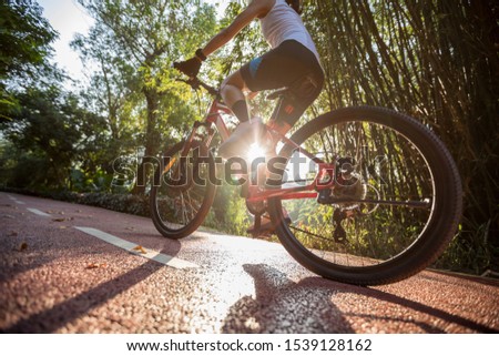 Similar – Image, Stock Photo Cycling in the park