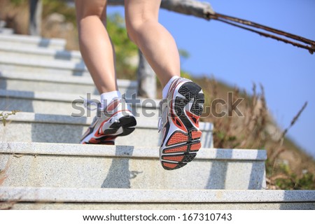 sports legs running/move up on mountain stairs