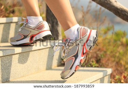 sports legs running/climbing on mountain stairs