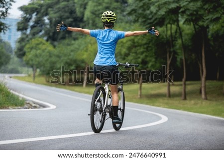 Similar – Image, Stock Photo Bicycle ride in the evening in the forest, in almost setting sunshine.