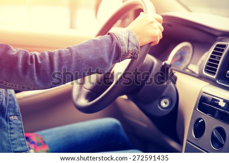 young asian woman driver driving car