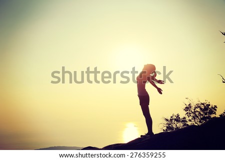 Similar – Image, Stock Photo Cheerful women on edge of mountain