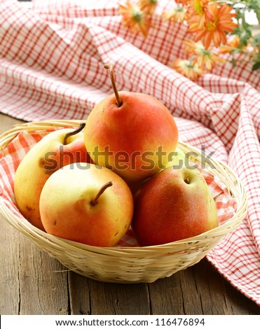 fresh autumn   juicy pear on a wooden table