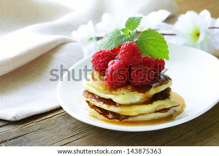 homemade pancakes with berries and mint - a delicious and healthy breakfast