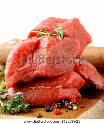 fresh raw beef meat on cutting board