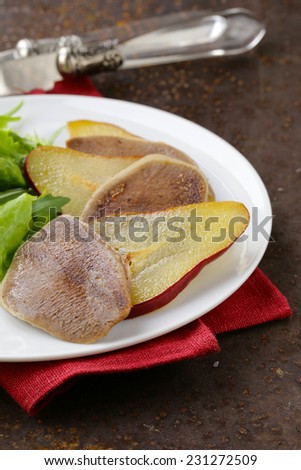 gourmet salad with grilled beef tongue and pear