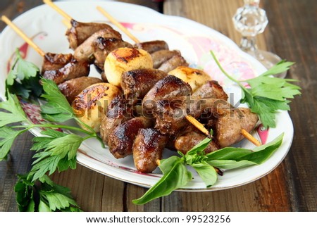 Fried grilled chicken hearts on skewers