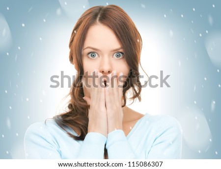 bright picture of pretty woman with hands over mouth.