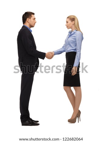bright picture of man and woman shaking their hands.