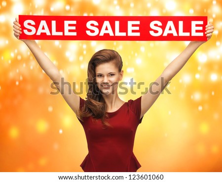 picture of teenage girl in red dress with sale sign