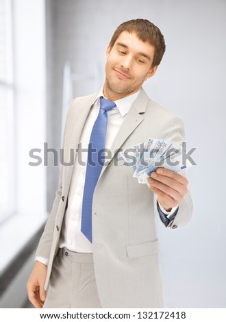 picture of handsome man with euro cash money