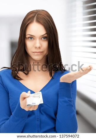 picture of unhappy woman with euro cash money