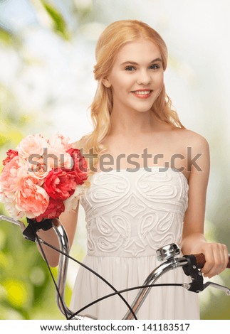 picture of country girl with bicycle and flowers