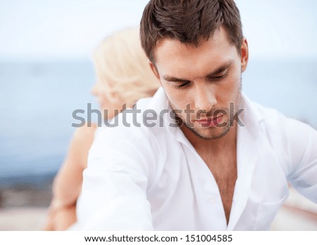 dating and relationships concept - stressed man with man outside