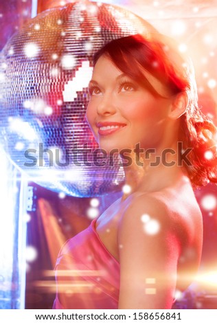 luxury, vip, nightlife, party, christmas, x-mas, new year\'s eve concept - beautiful woman in evening dress with disco ball