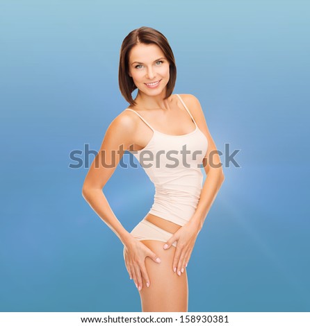 Woman in Cotton Underwear Showing Slimming Concept Stock Photo