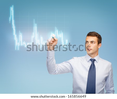 business, money and office concept - attractive buisnessman or teacher with marker drawing forex chart
