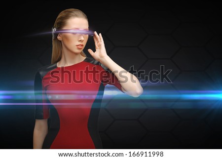 business and future technology concept - beautiful woman with futuristic glasses