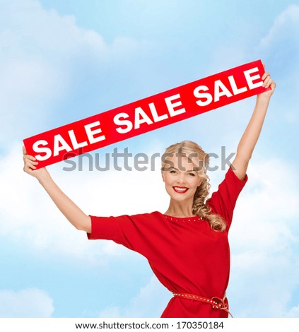 shopping, sale, christmas and x-mas concept - smiling woman in dress with red sale sign
