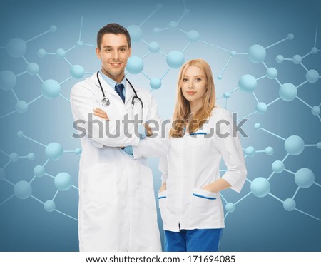 healthcar, research, science, chemistry and medical concept - picture of two young attractive doctors