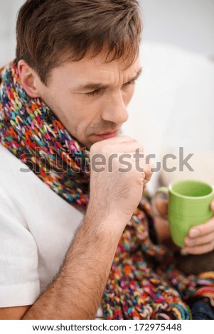 healthcare and medicine concept - ill man with flu at home