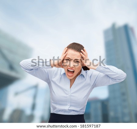 business, office and stress concept - angry screaming businesswoman outdoors