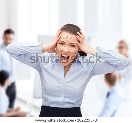 business, office and stress concept - angry screaming businesswoman