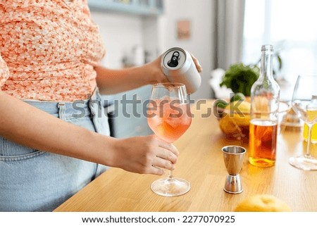 Similar – Image, Stock Photo Woman pouring cocktail in metal mug