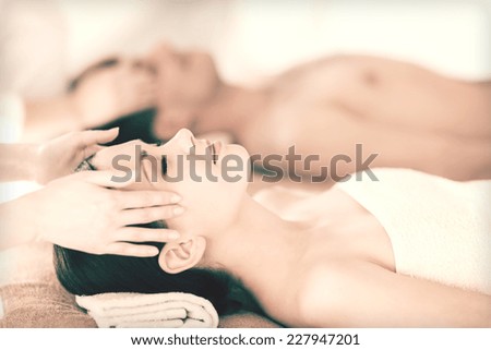 picture of couple in spa salon getting face treatment