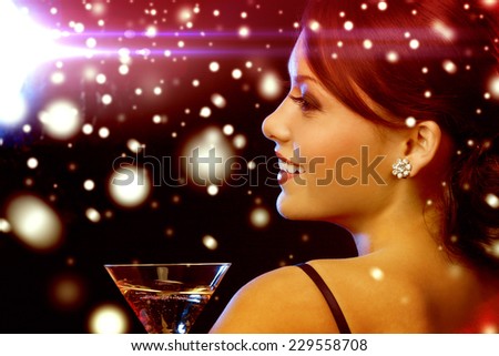 luxury, vip, nightlife, party, christmas, x-mas, new year\'s eve concept - beautiful woman in evening dress with cocktail