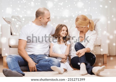 family, childhood, communication, people and home concept - smiling parents with little girl sitting on floor at home