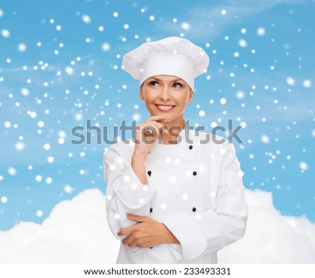 christmas, cooking, holidays and people concept - smiling female chef, cook or baker dreaming over sky and cloud background