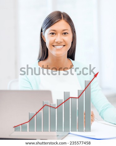 business, education and technology concept - asian businesswoman or student with laptop, graph and documents in office