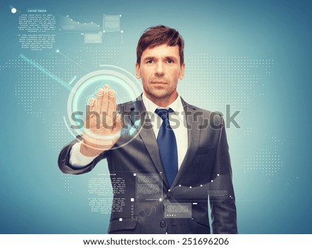 business, future technology and office concept - attractive buisnessman working with virtual screen