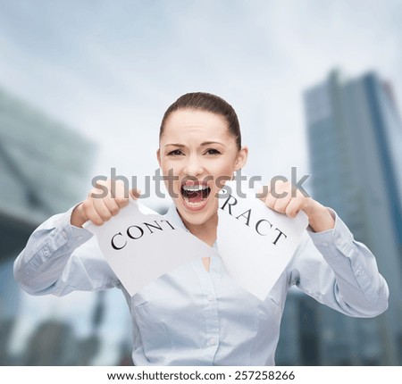 business, documents, people, legal and real estate concept - serious businesswoman tearing contract outdoors
