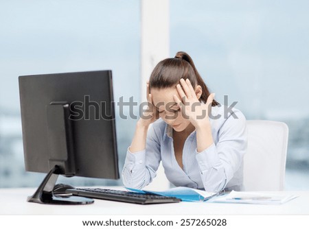 business, office, school and education concept - stressed businesswoman with computer and documents at work