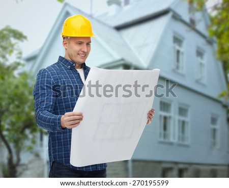 repair, construction, building, people and maintenance concept - smiling male builder or manual worker in helmet with blueprint over living house background