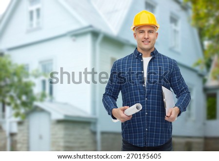 repair, construction, building, people and maintenance concept - smiling male builder or manual worker in helmet with blueprint and clipboard over living house background