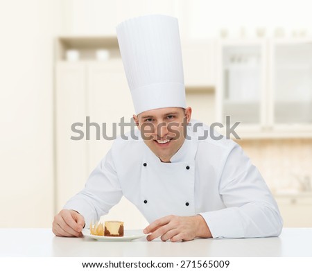 cooking, profession, haute cuisine, food and people concept - happy male chef cook with dessert over kitchen background