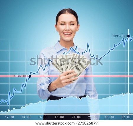 business and money concept - young businesswoman with dollar cash money and chart over blue background