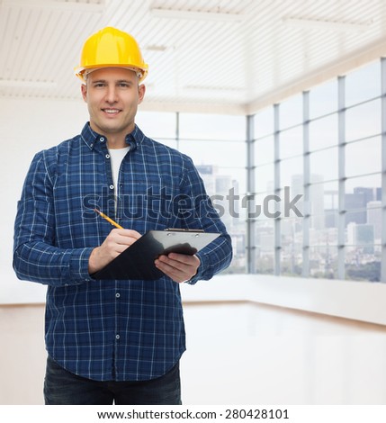 repair, construction, building, people and maintenance concept - smiling male builder or manual worker in helmet with clipboard taking notes over empty flat background