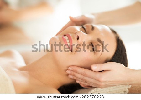 close up of woman in spa salon getting face treatment