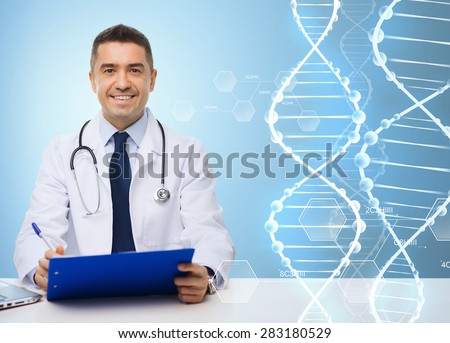 medicine, profession, technology and people concept - happy male doctor with clipboard and stethoscope over blue background and dna molecule structure