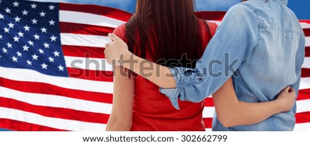 people, homosexuality, same-sex marriage, gay and love concept - close up of happy women couple hugging over american flag background