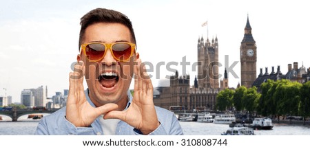 travel, tourism, emotions, communication and people concept - face of angry middle aged latin man in shirt and sunglasses shouting london city background