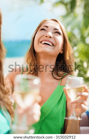 summer holidays, vacation and celebration - girl with champagne glass