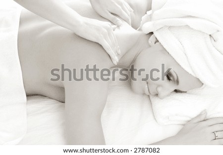 monochrome picture of lovely lady in massage salon